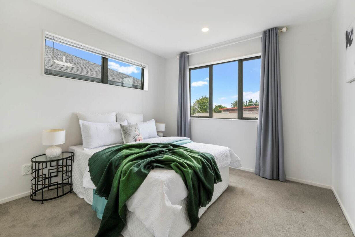 Bedroom with a high horizontal window and a tall side window, Albany Village