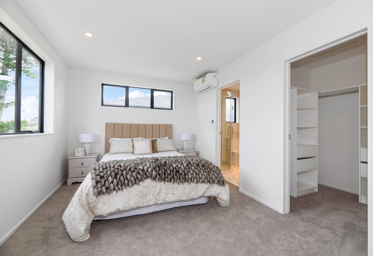 Bedroom with a heat pump and a walk-in wardrobe alongside, Blockhouse Bay