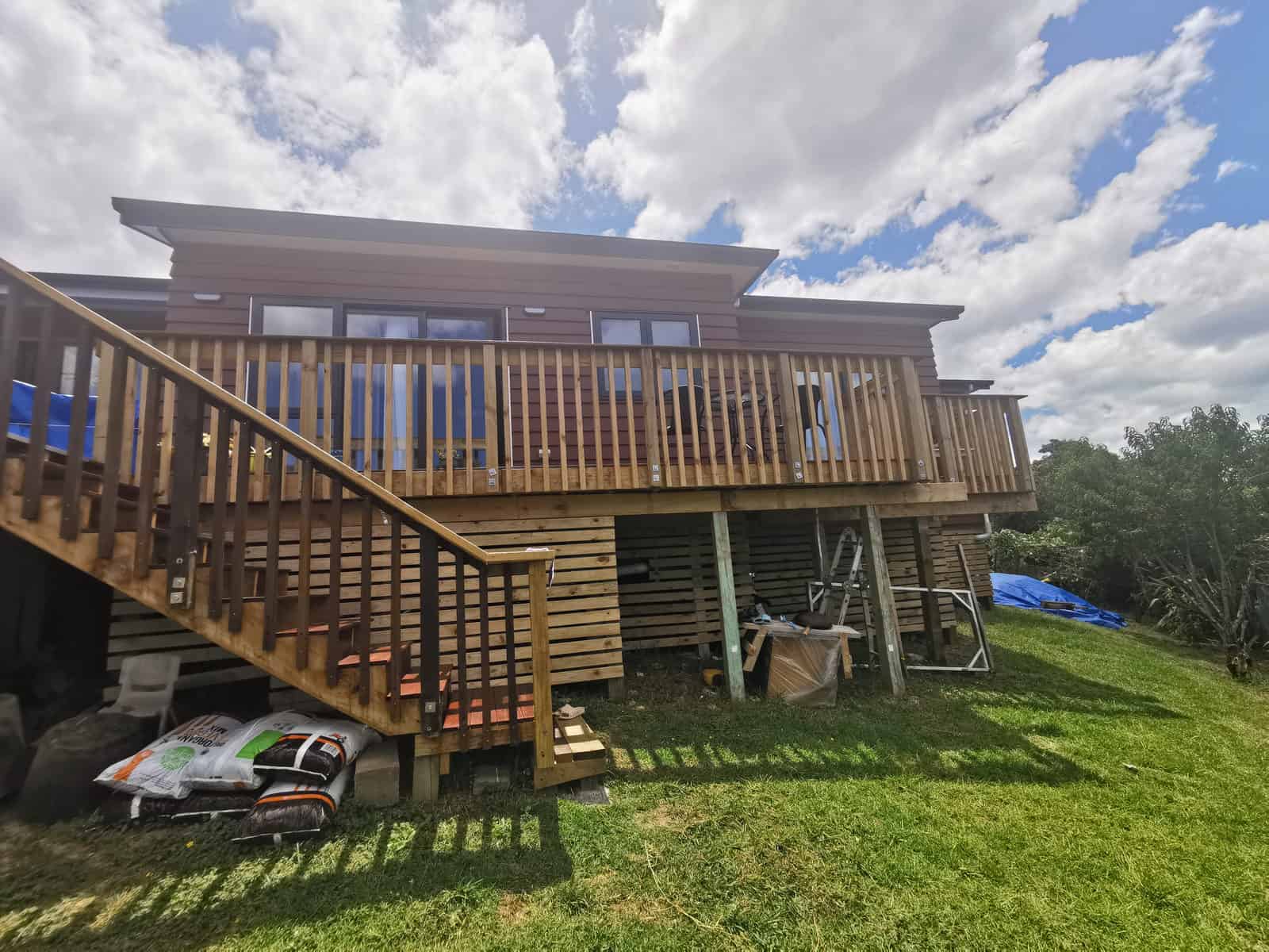 Existing rear deck and external stair with the lawn below, Botany Downs