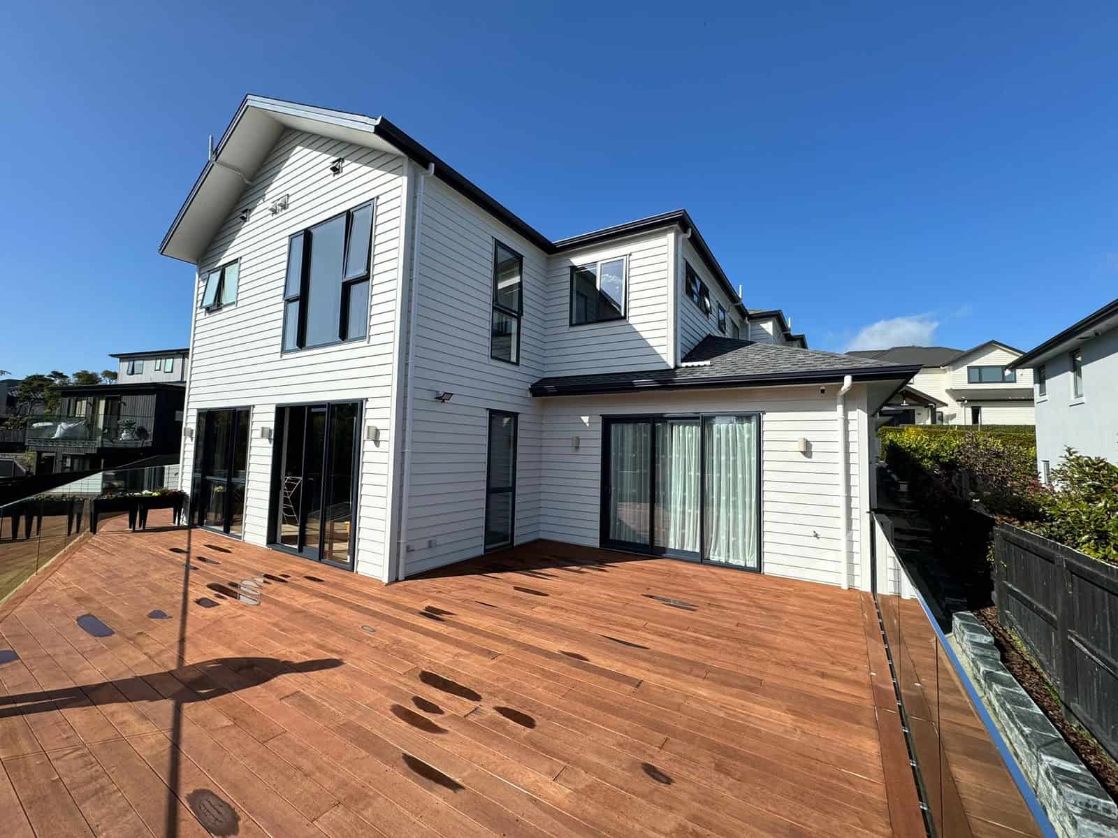 Wide hardwood deck running along the rear of the house, Greenhithe