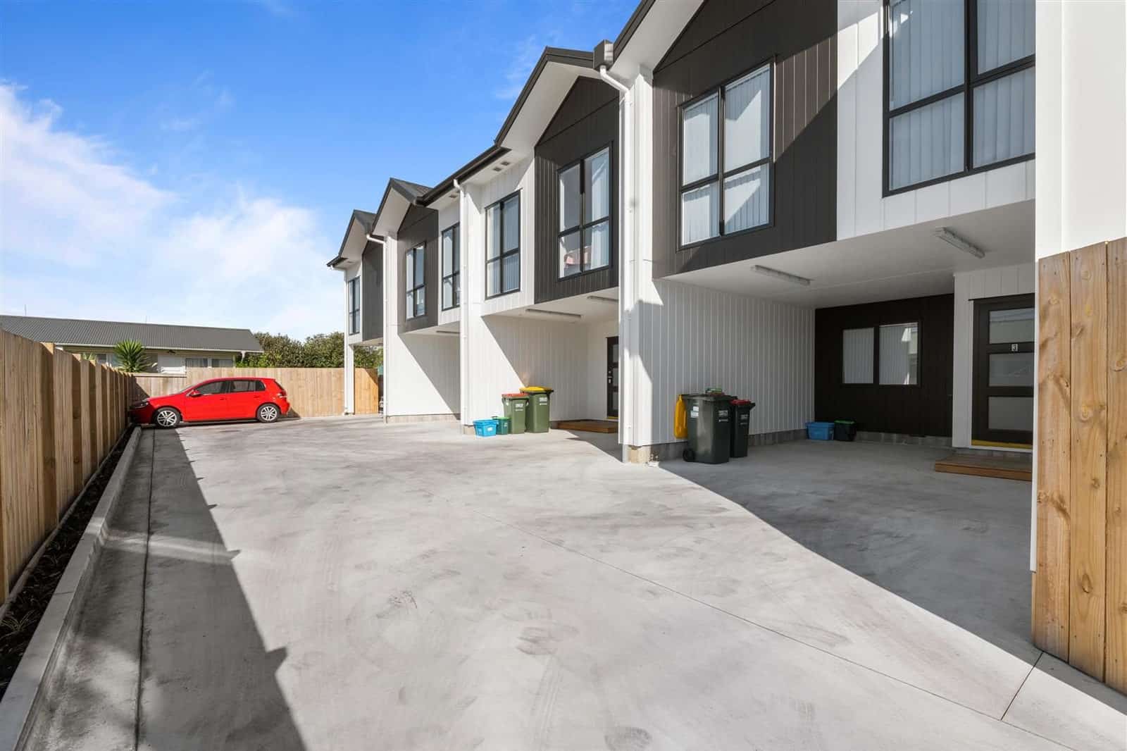 Shared drive running past the carports of the terrace row, Hamilton
