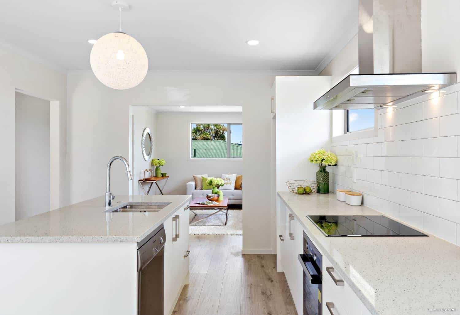 Kitchen looking along the island to the living area, Te Atatu South