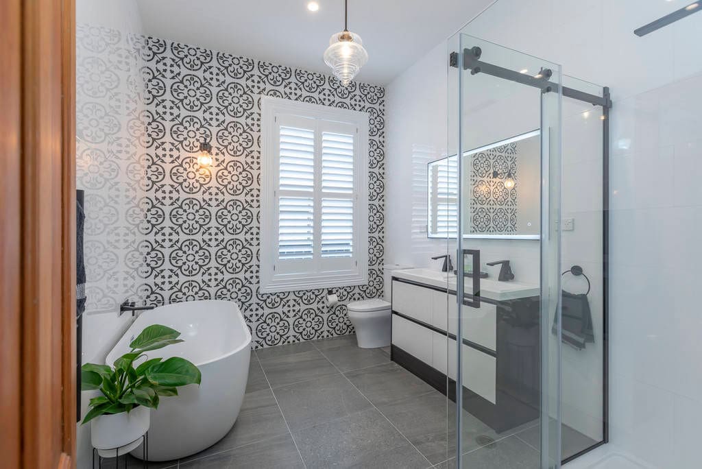 Bathroom with a freestanding bath, patterned feature tiling and a walk-in shower, Kingsland