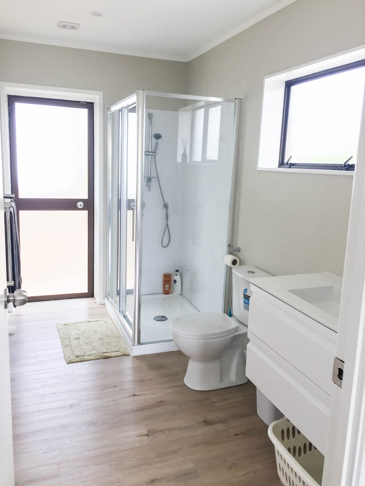 Existing bathroom with a shower, toilet and vanity, Mairangi Bay