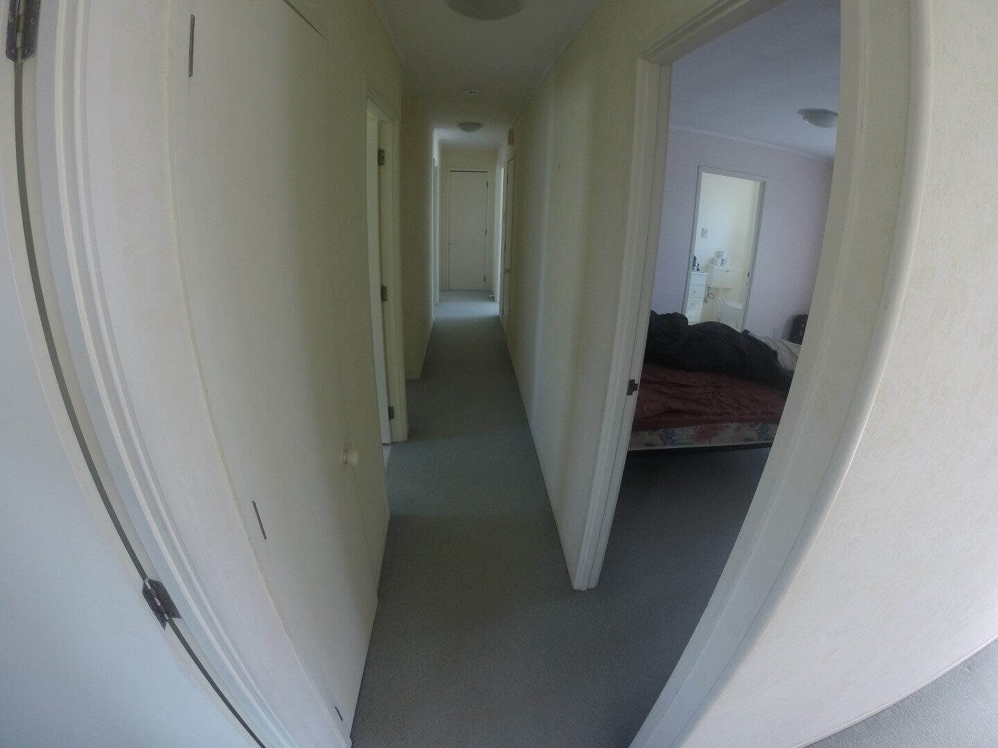 Existing hallway looking through to a bedroom, Mairangi Bay