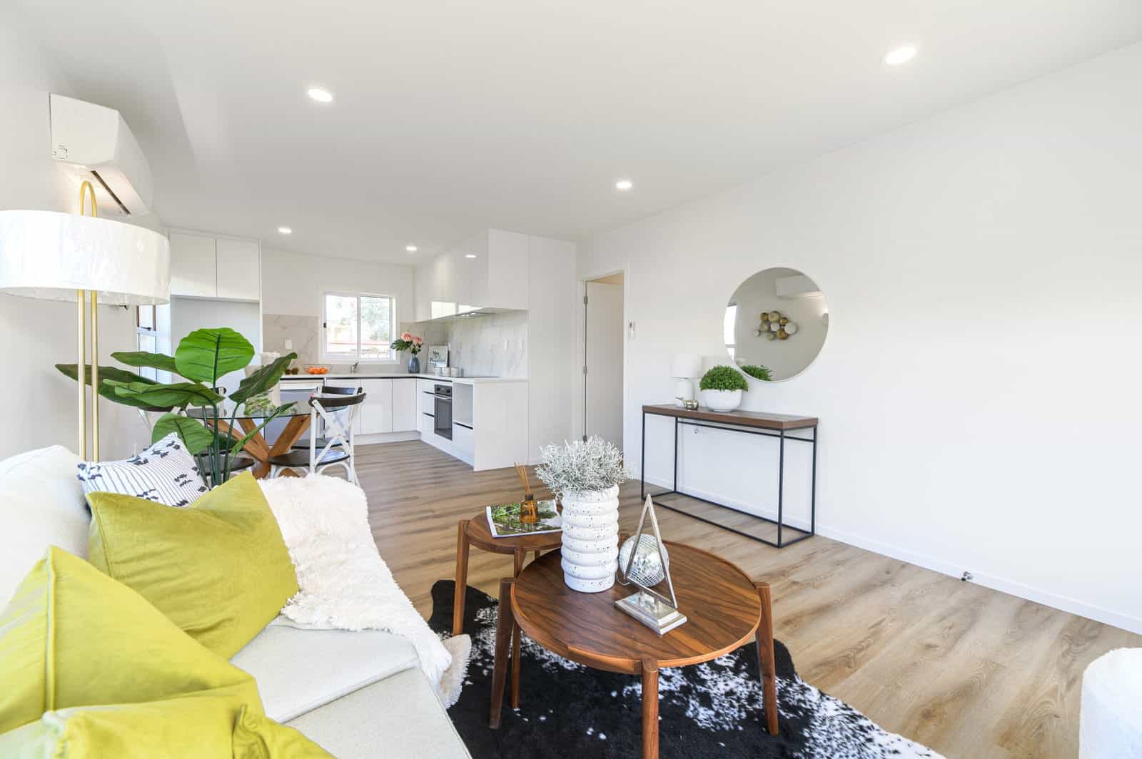Renovated open-plan living and kitchen in a Milford unit