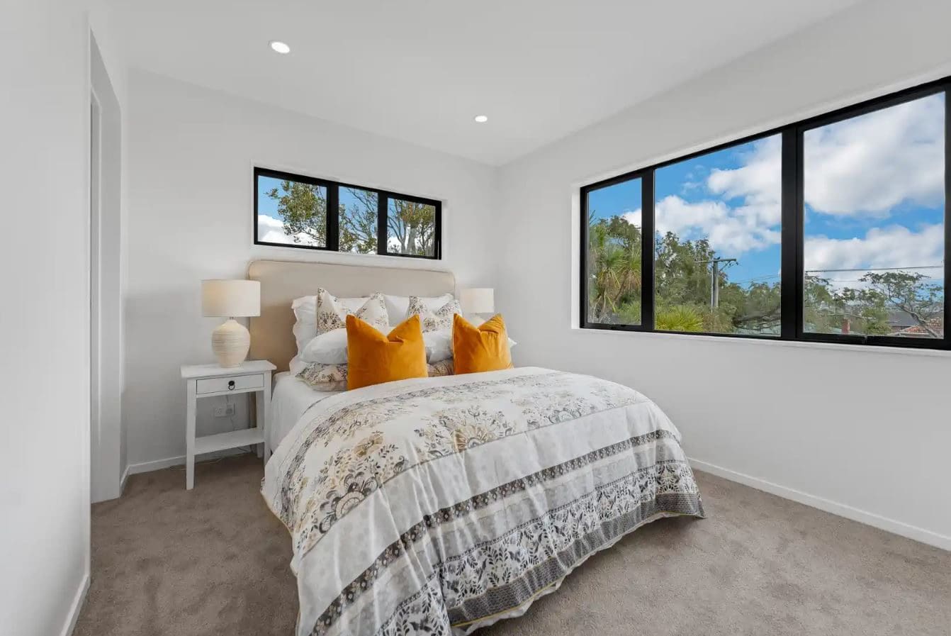 Bedroom with windows on two walls and a timber outlook, New Windsor