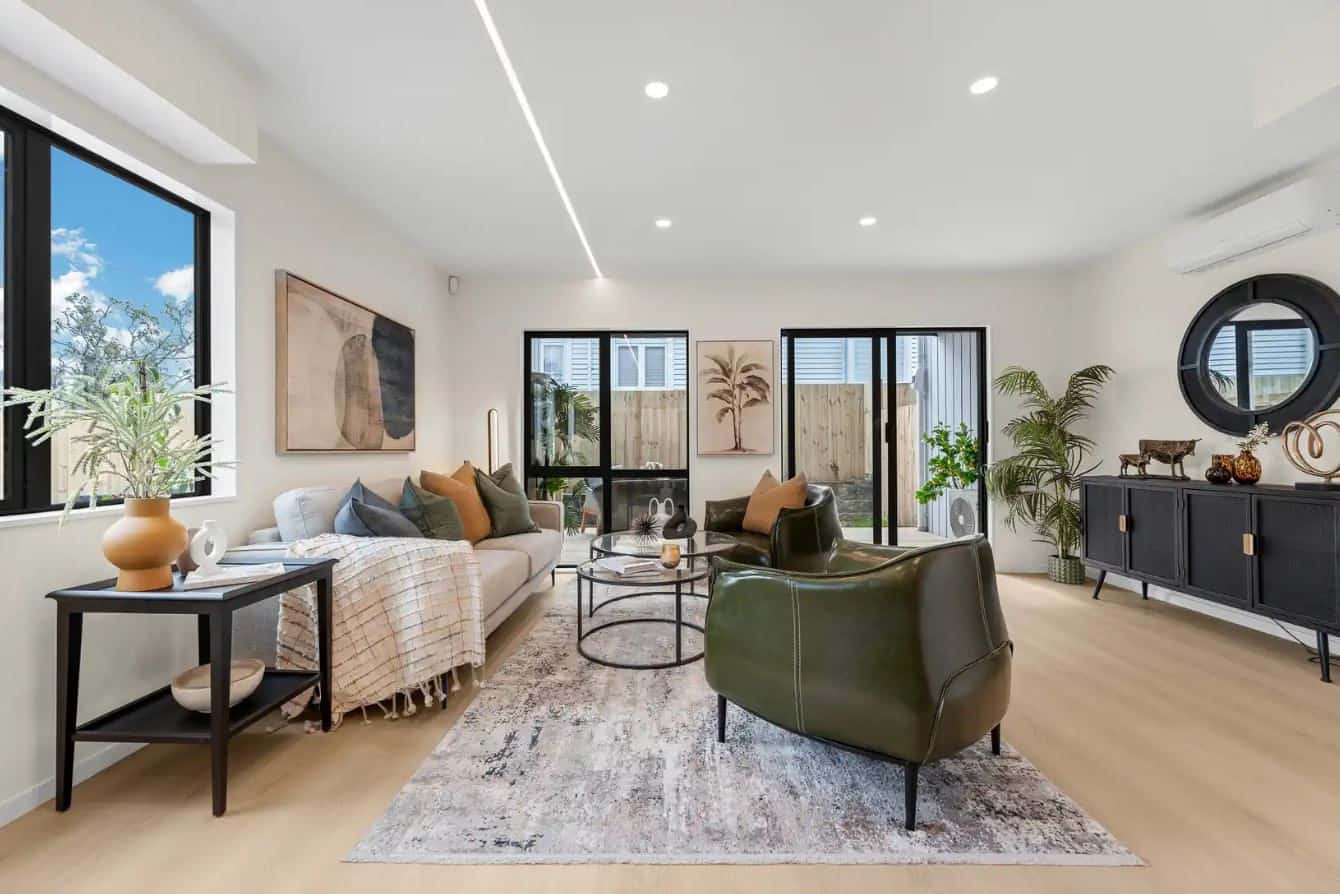 Living room with a sofa, armchair and sliding doors to a courtyard, New Windsor
