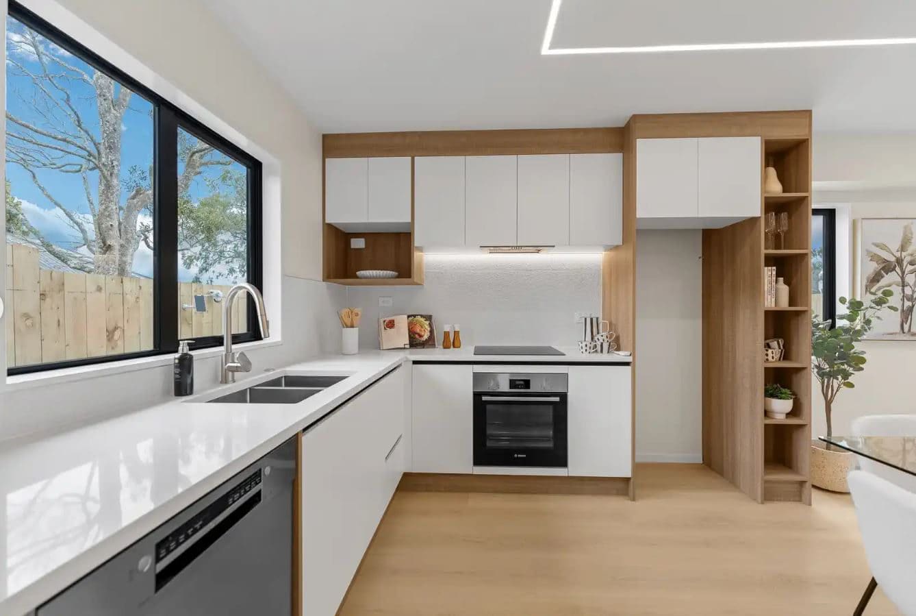 Kitchen with a white benchtop, dishwasher, wall oven and timber shelving, New Windsor
