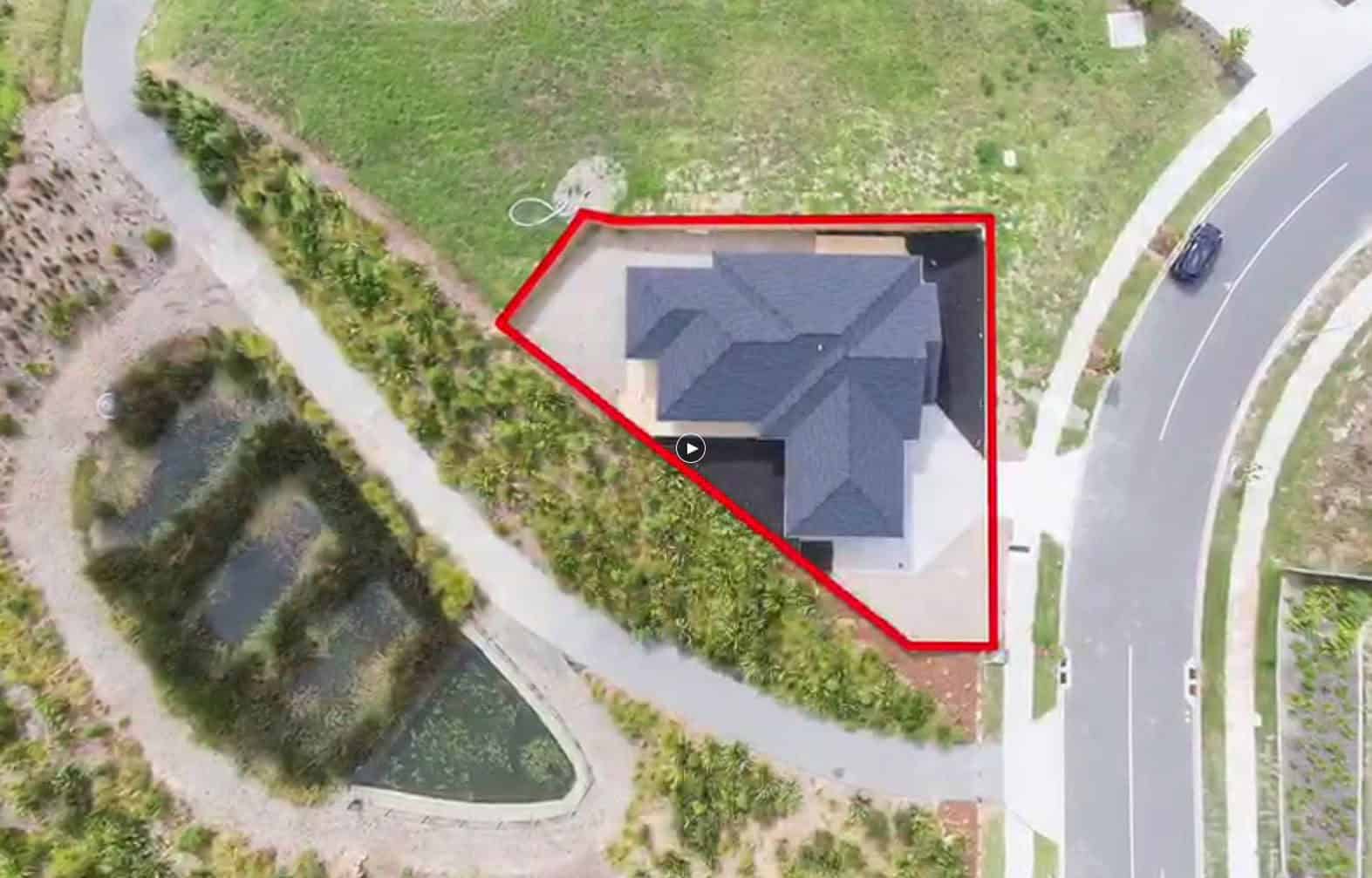Aerial looking straight down on the roof with the site boundary marked in red, Orewa