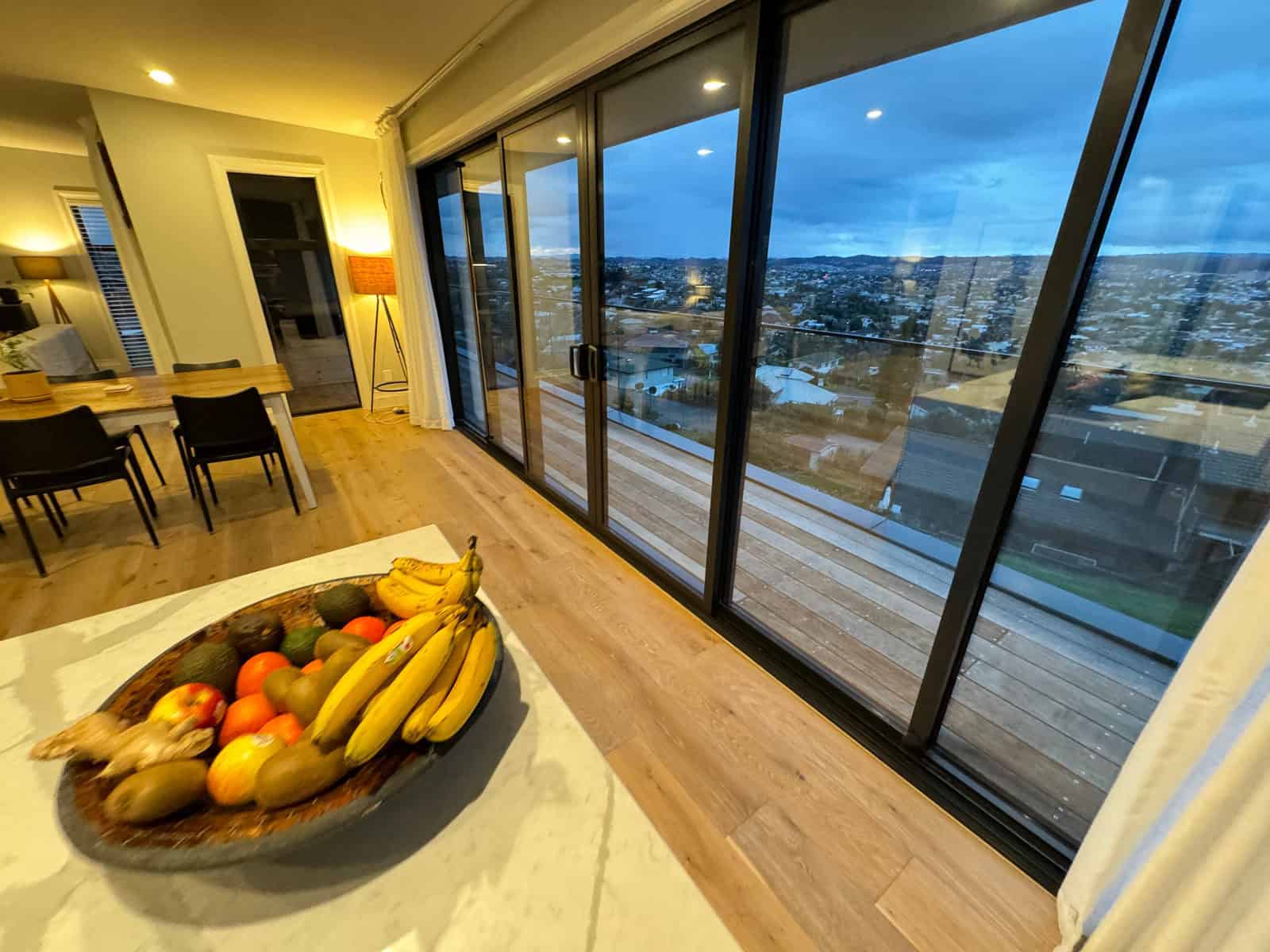 Dining and kitchen looking out through the sliding doors to the view, Red Beach