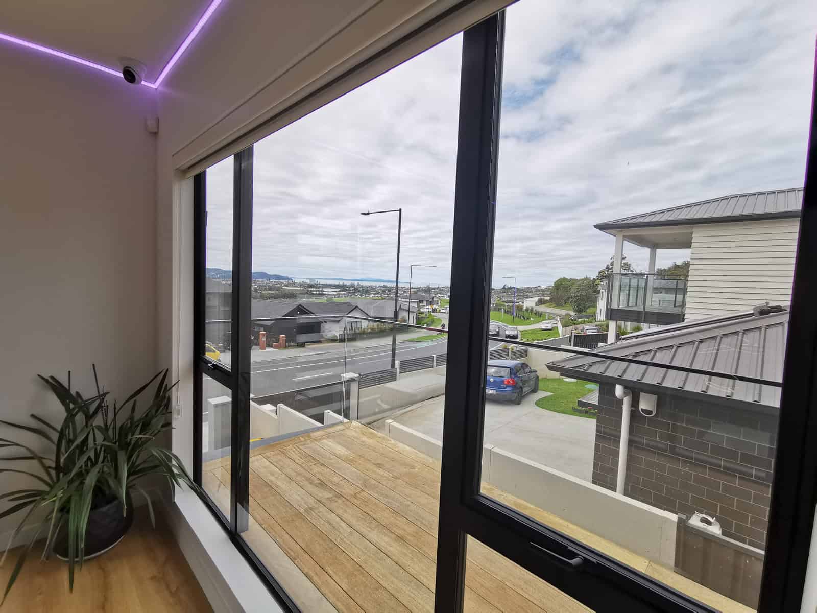 Sliding doors opening from the living room onto the balcony, Silverdale