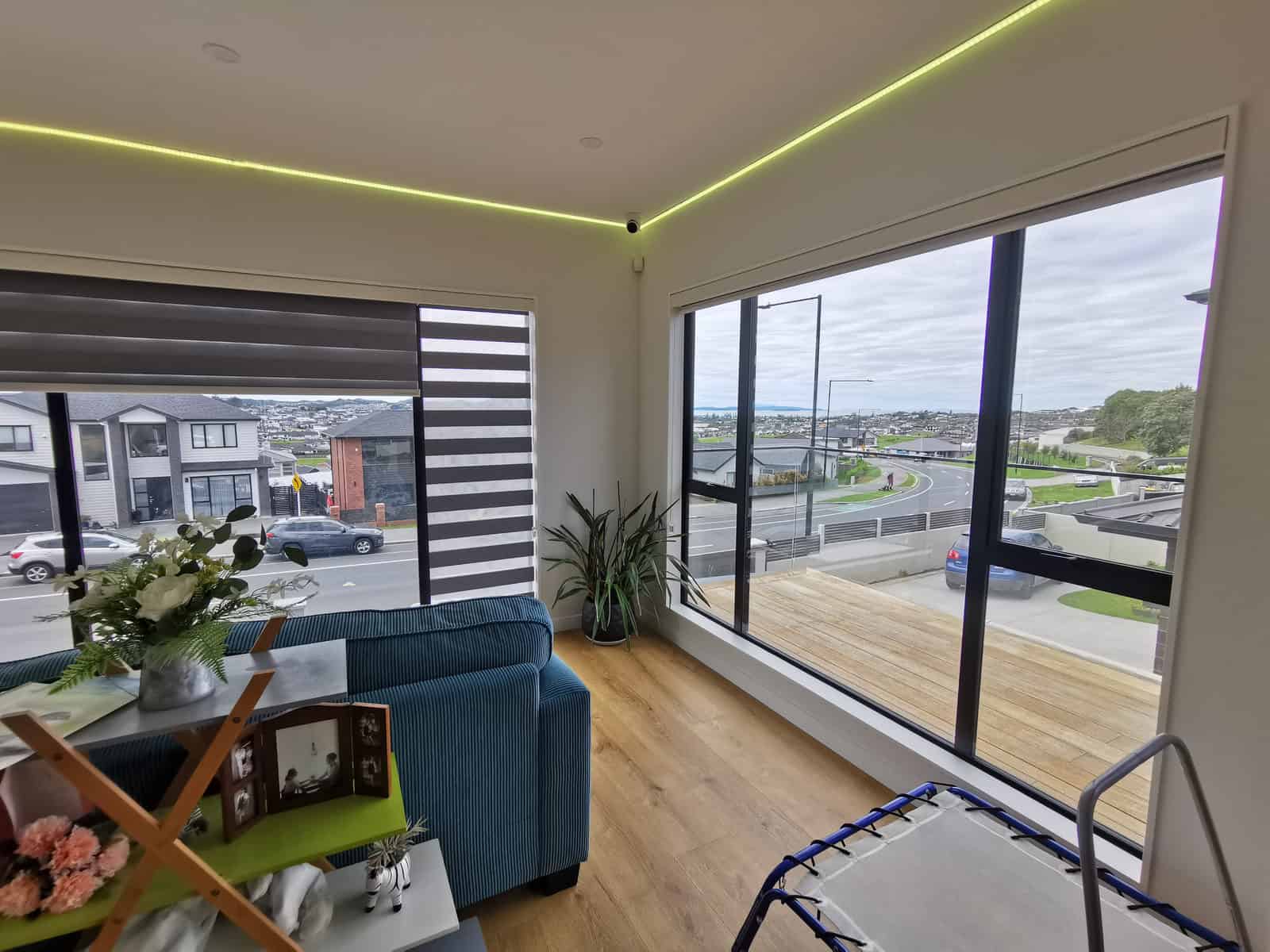 Living room with a corner window and a sliding door to the deck, Silverdale