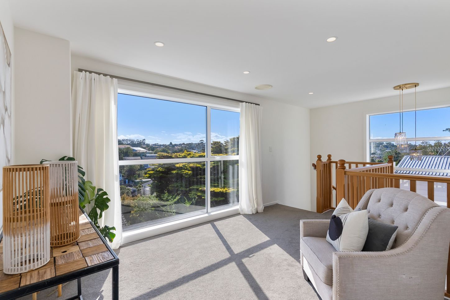 Living area with a wide window looking out over the valley, Sunnynook