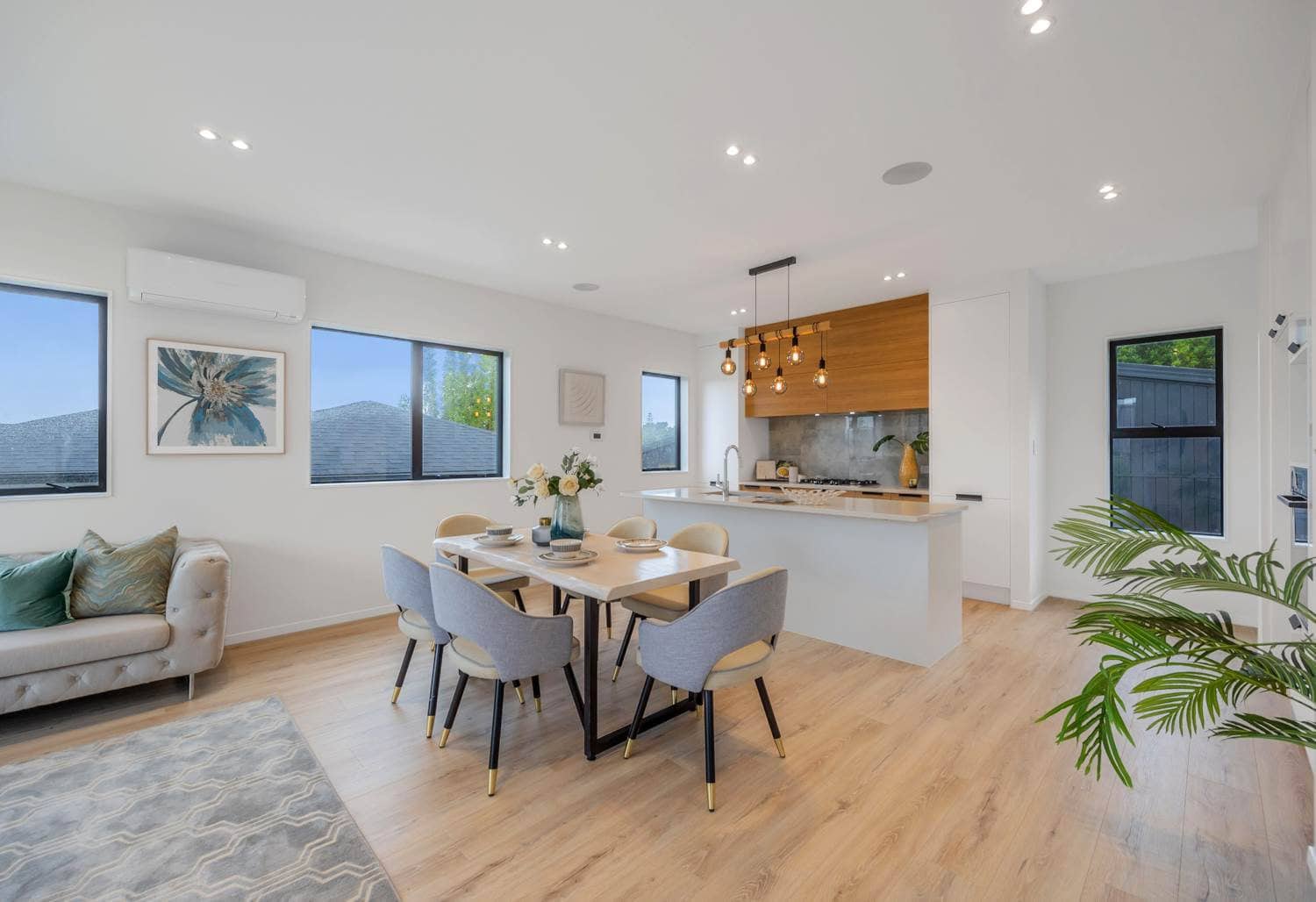 Living and dining looking through to the kitchen island and pendant lights, Torbay
